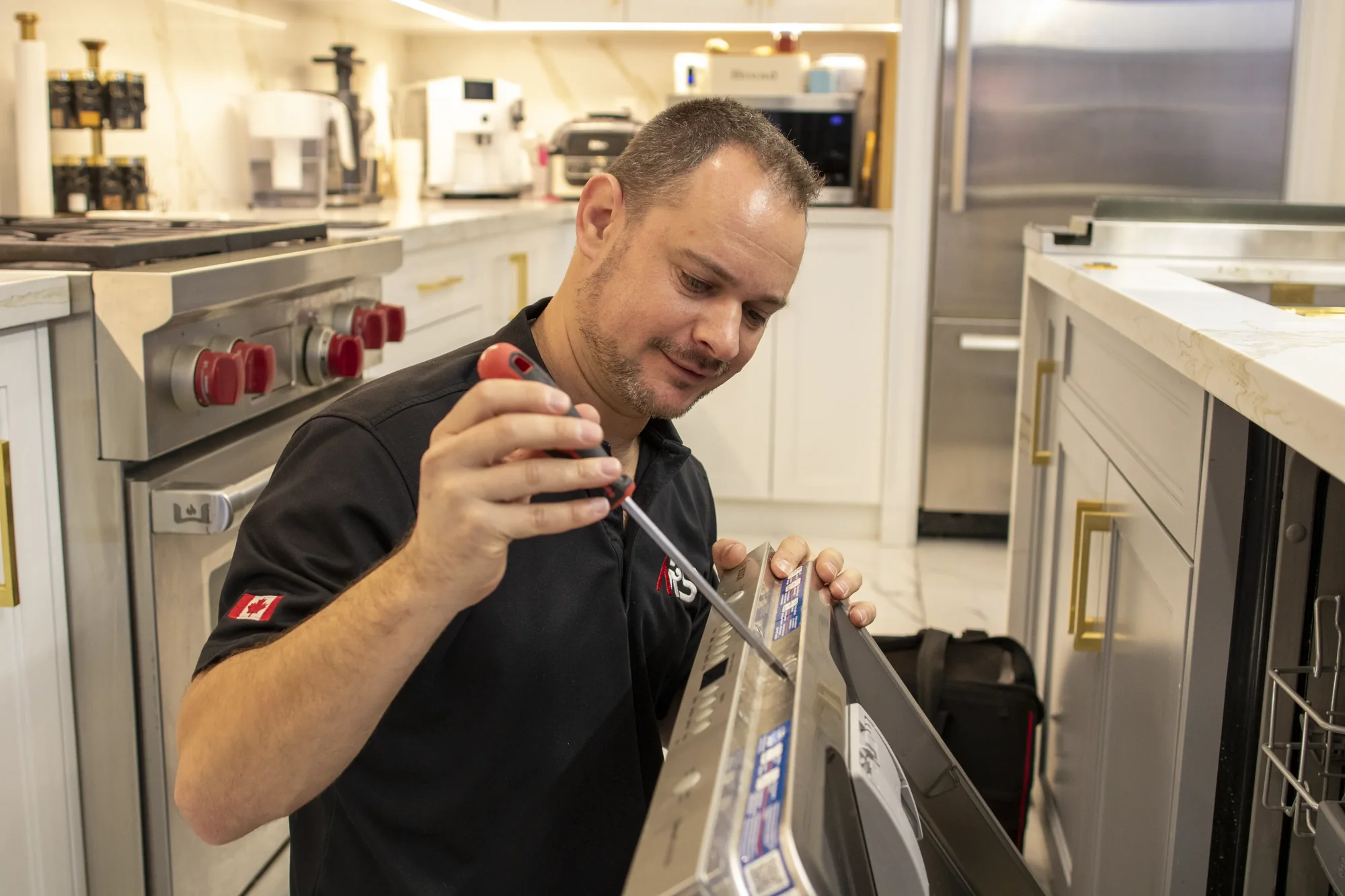 Appliance technician speaking with Ajax homeowner Appliance technician speaking with Ajax homeowner